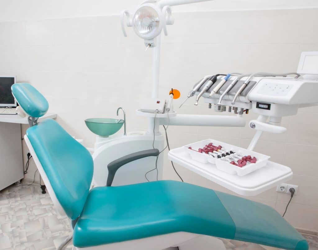Empty dental chair and dental tools in Stoney Creek dentist's office